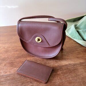 Vintage Orvis small crossbody purse in brown leather, with card case.